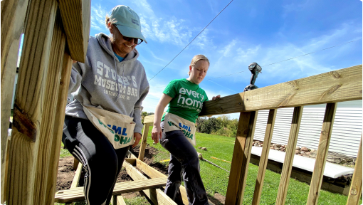 Volunteers building a Habitat accessibility ramp