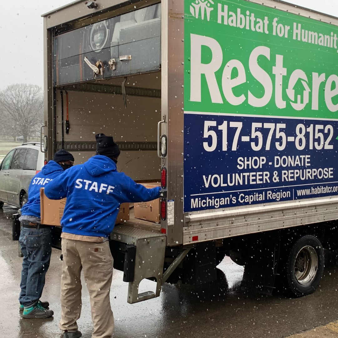 habitat_for_humanity_capital_region_restore_truck_backpack_donation_december_2021