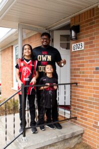 De'Angelo, Jaedyn, and Jordan proudly display their new house keys!