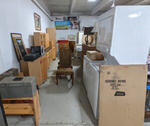 Furniture packed onto the sales floor for National Thrift Shop Day 2022