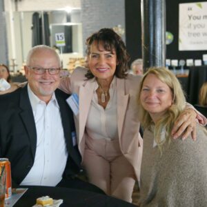 Habitat supporters and board members pause their chat for a photo at the Heart of Habitat 2024 Gratitude Gala.